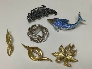 Vintage Crystal And Goldtone Brooches.  Pins.  Flower.  Dolphin.  Leaf.  Etc.