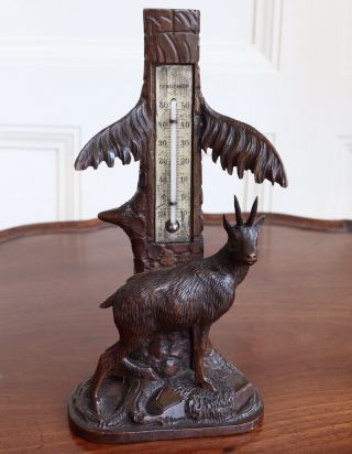 An Antique 19th Century Black Forest Carved Wood Desk Thermometer,  Goat.  24cm.