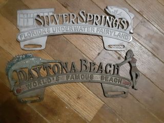 2 Vintage License Plate Topper Silver Springs & Daytona Beach