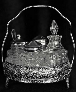 Vintage Glass Bottle Cruet Set In Silver Metal Round Holder With Handle
