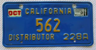 California (blue Base) Distributor License Plate,  Nissan 562