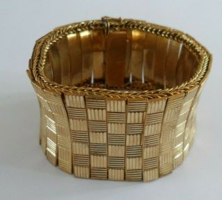 Vintage Articulated Gold Toned Metal Bracelet,  With Basket Weave Engraving.