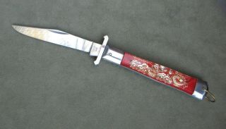 Vintage Japan Stainless 9.  25 Inch Red Matador Swing Guard Knife