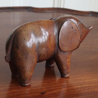 A Folk Art Carved Wood Elephant Toy With Glass Bead Eyes,  19th Century.  17.  5cm. 3