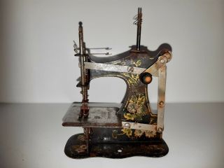Antique Muller No.  1 Front Winder Tinplate Toy Sewing Machine