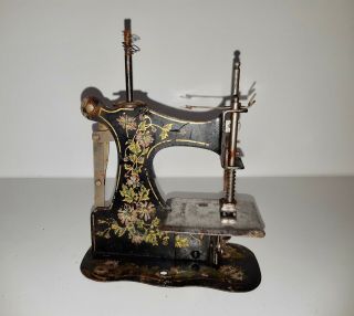 Antique Muller No.  1 front winder tinplate Toy sewing machine 2