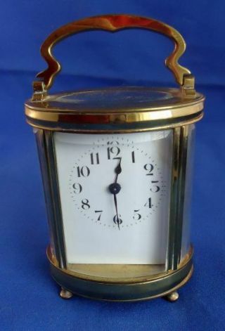 Antique French 8 Day Oval Beveled Glass Carriage Clock