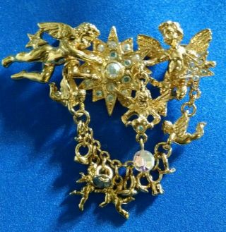 Vintage Kirks Folly Angels Star Rhinestone Dangle Gold Tone Pin Brooch Cupid