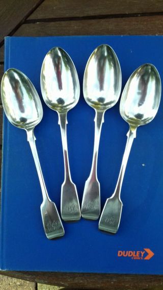 Four Matching Early 19th Century Sterling Silver Serving Spoons,  Lias,  London.
