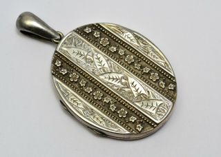 Antique Victorian Silver Wash Engraved Ivy Leaves And Floral Rows Oval Locket