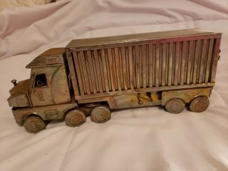 Vintage Copper Tin Tractor Trailer.  Music Box Plays On The Road Again.