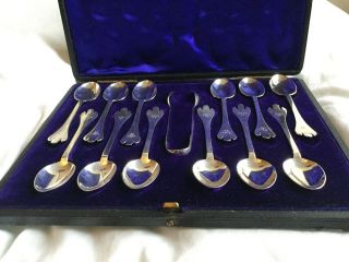 Boxed Set Of 12 Britannia Silver Teaspoons And Sugar Tongs,  London 1899