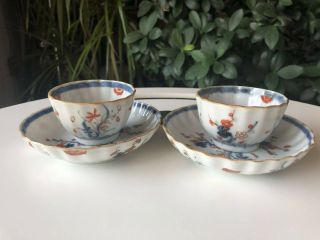 A Chinese Kangxi Blue & White And Famille Verte Tea Cups And Saucers