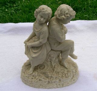 parian ware 19th c.  english figurine charming boy and girl sitting signed 2