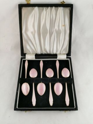 A Set Of Silver And Pink Enameled Teapoons
