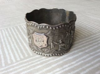 Late 19th Century/early 20th Chinese Silver Village Scenes Napkin Ring.  1