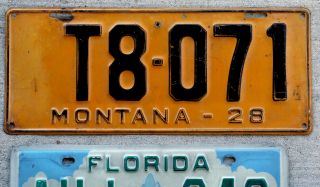 1928 Black On Orange Montana Truck License Plate