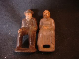 Old Vtg Collectible Cast Iron Figures Figurines Man Woman Lady Sitting Elderly