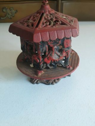 Vintage Cast Iron Carousel Merry Go Round Coin Bank Red And Black Spins