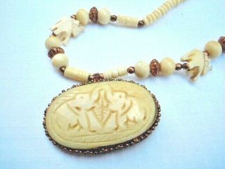 Vintage Carved Ivory Colored Bovine Bone Necklace: Copper,  Beads And Spacers