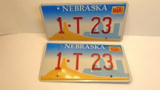 Vintage Nebraska Vanity License Plate Pair " 1 - T 23 " Chimney Rock Model T 2002