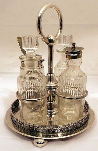 A Victorian silver - plated 4 - bottle cruet set,  Sheffield c.  1870. 2