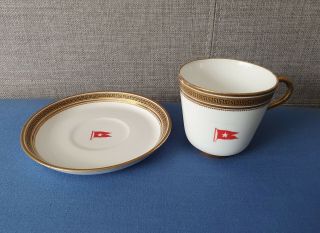 A Cup And Saucer With A Painted White Star Line Flag.  Titanic Interest