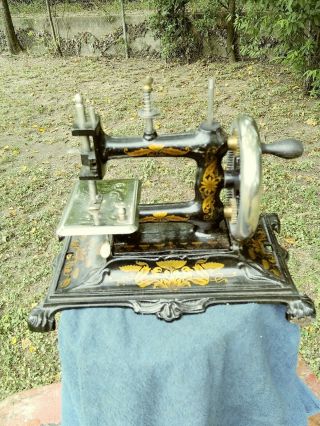 ANTIQUE CAST IRON MULLER CHILD SEWING MACHINE MADE IN GERMANY 15 ? 2