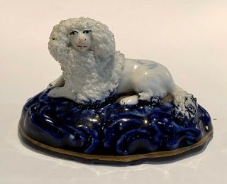 Antique Staffordshire Porcelaineous Recumbent Poodle On Cobalt Base