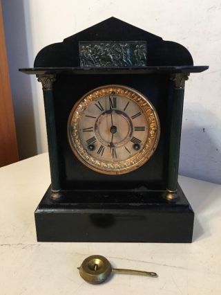 Antique Ansonia Iron Case Mantle Clock With Grecian Roman Columns Motif Plaque