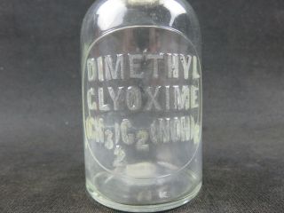 Dimethyl Glyoxime (CH3) 2 (NOH) 2 embossed apothecary bottle TCW Co U.  S.  A 1 - M - 8 5 2