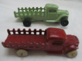 2 Vintage Slush Cast Metal Stake Bed Toy Trucks Fred Green Barclay