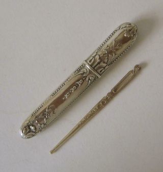 An Antique French Solid Silver Sewing Needle Case With Wool Darning Needle