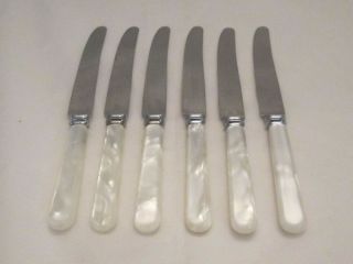 A Vintage Set Of 6 Dinner Knives With Faux Mother Of Pearl Handles