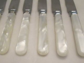 A Vintage Set of 6 Dinner Knives with Faux Mother of Pearl Handles 2