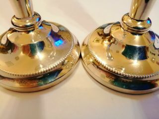 A mid sized 1982 A T Cannon Birm ' sterling silver candle sticks 243 gms 2