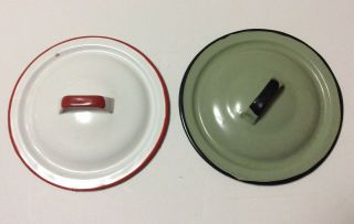 Two (2) Vintage Porcelain Coated Metal Lids 6 1/2” One Green & One Red & White