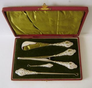 A Cased Sterling Silver Handled Set Of Glove Stretchers Shoe Horn & Button Hooks
