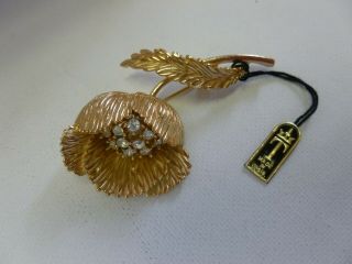Pretty Vintage Crown Trifari Textured Gold Tone Poppy Rhinestone Flower Brooch