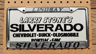 Vintage Metal Dealer License Plate Frame And Insert Larry Stone Chevy Lindsay Ca