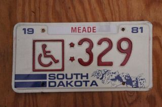 1981 South Dakota Mt Rushmore Wheelchair Handicap License Plate Low 329