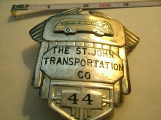 The St.  John Transportation Co.  44 Cap Badge
