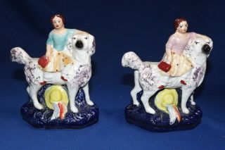 2 Antique Old Staffordshire Ware England Figurines Girl On Dog Both Lefts