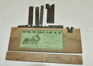 L104 - Antique Cutters For Stanley No.  45 Plane Cutter Box Plus Few Extra Blades