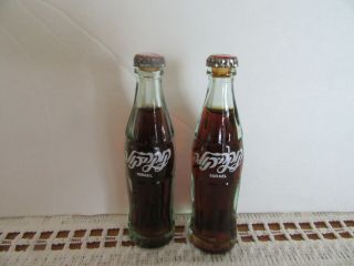 Vintage Coca Cola Mini 3 1/8” Glass Bottle Metal Lid With Actual Coke Inside.