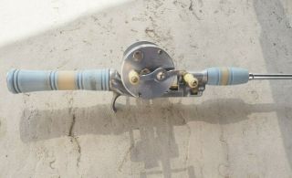 Vtg Orchard Industries Inc Action - Rod 55 Inch Steel Fishing Rod Blue Handle Reel