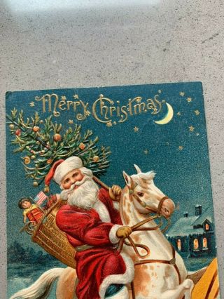 CHRISTMAS VINTAGE POSTCARD Santa on Rocking Horse with Toys & Tree 2