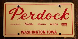 Perdock Olds Cadillac Pontiac Buick Gmc Washington,  Ia Dealership License Plate.