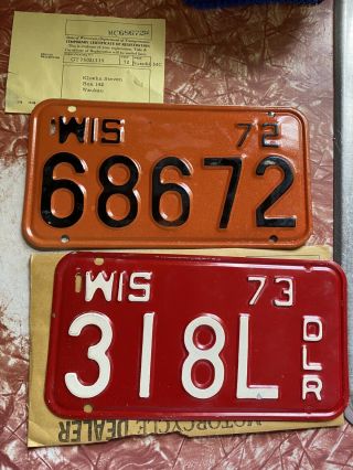 (2) 1972 & 1973 Wisconsin Motorcycle License Plates,  One Dealer
