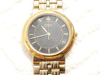 Vintage Seiko Quartz Black Dial Watch Gold Tone Stainless Steel